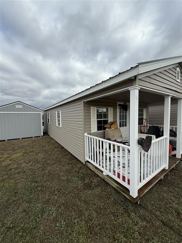 USED: 14x36 Vinyl Deluxe Gable Cottage